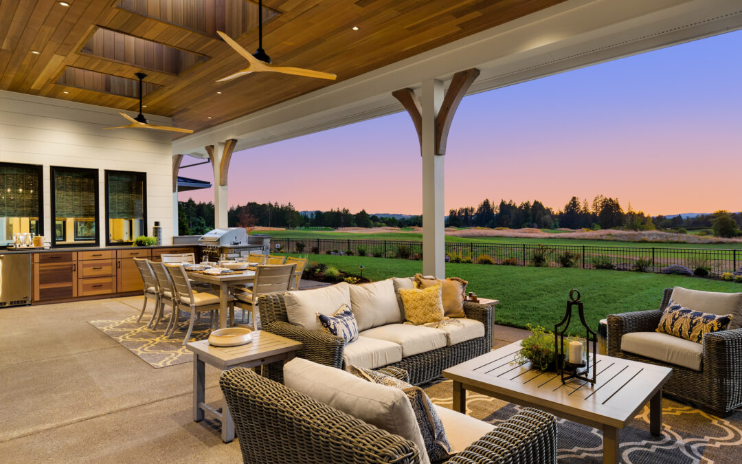 Covered deck with a beautiful sunset view for dek-drain-and-trex-rainescape blog.